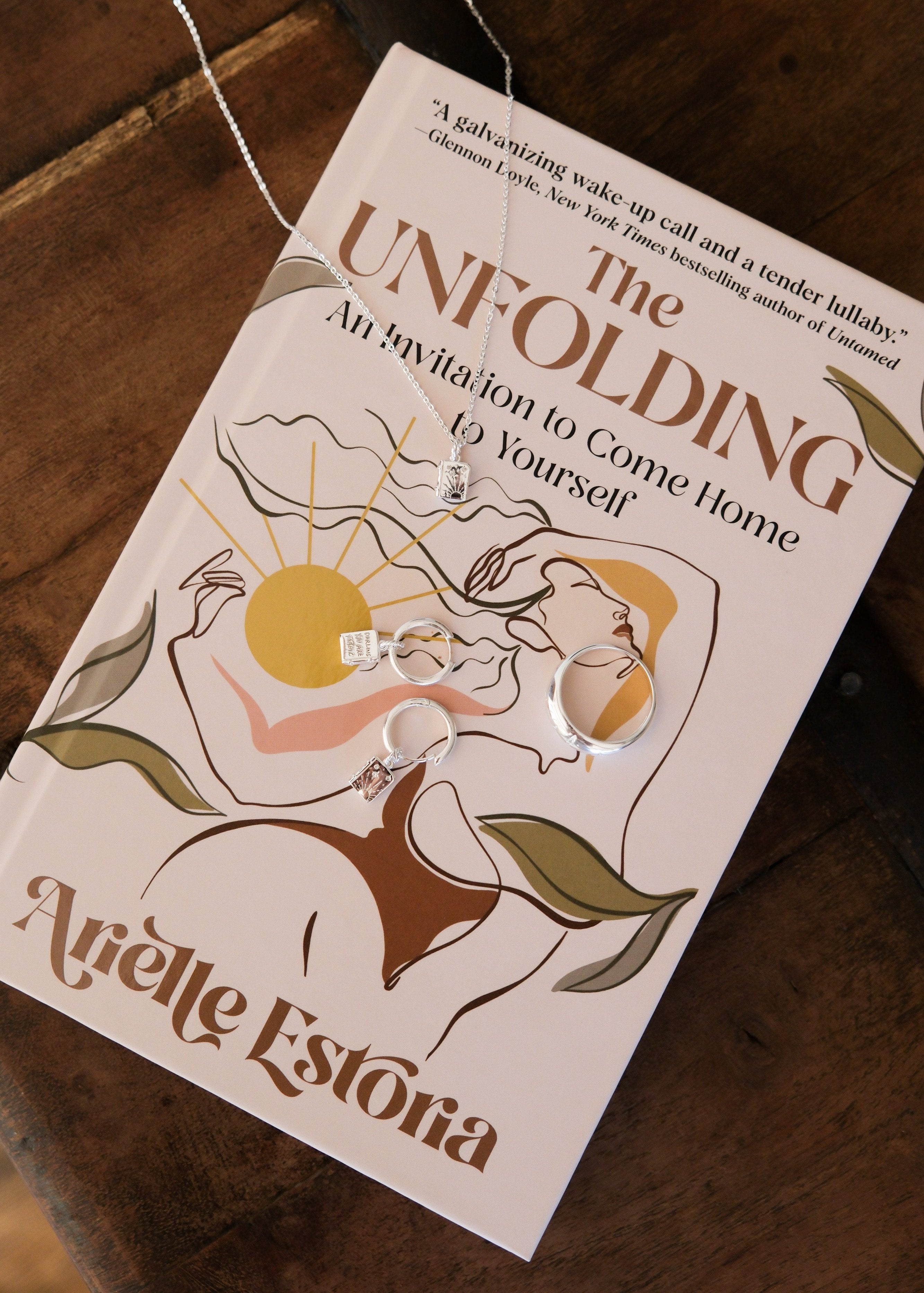 Cosmic Unfolding Book Charm